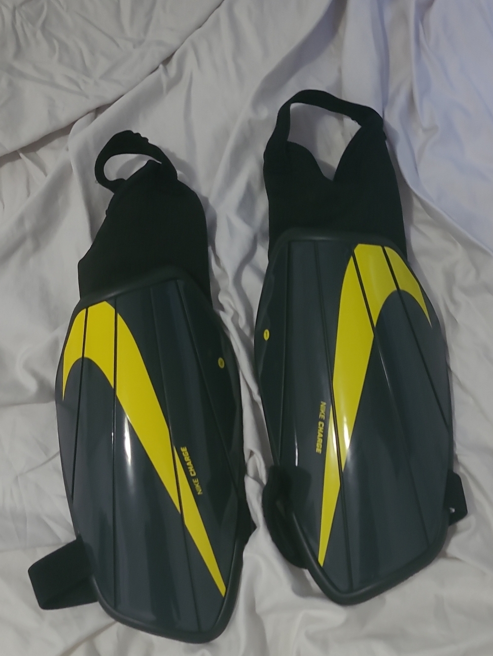 Nike Men’s Black and Yellow Soccer Shin Guards